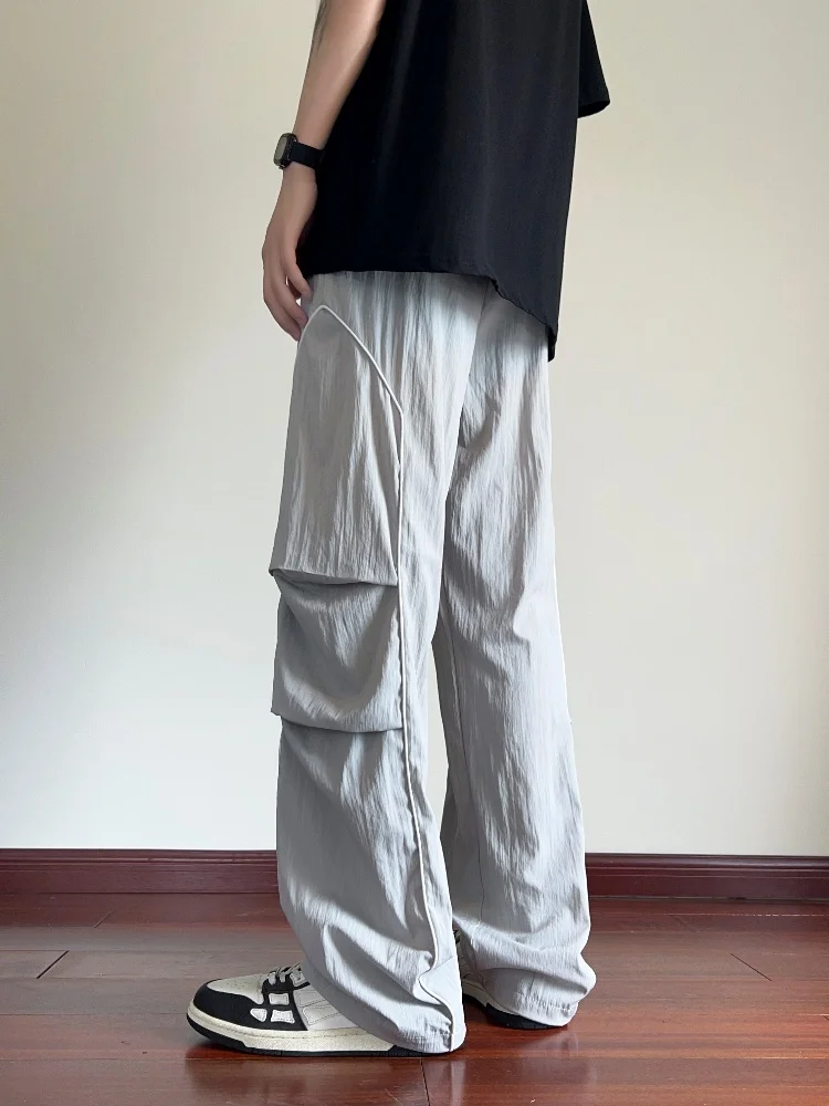 

Мужские летние тонкие брюки из ледяного шелка, драпирующиеся, быстросохнущие, свободного прямого кроя, в стиле парашютиста, модные повседневные брюки