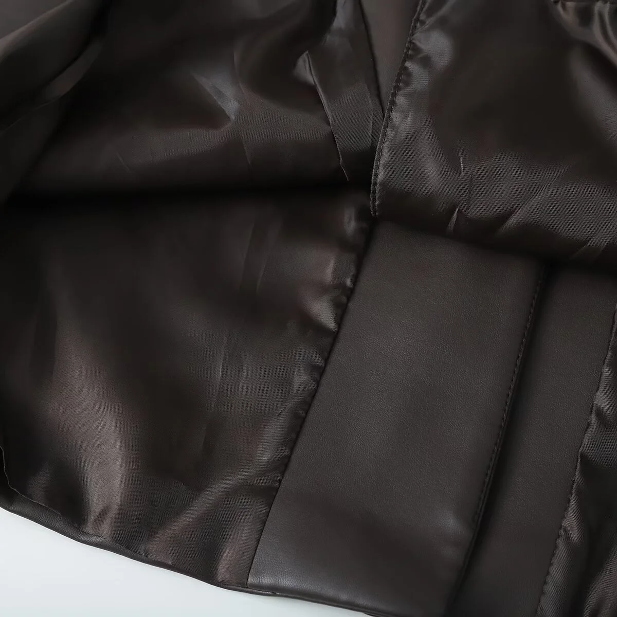 2025 الخريف منتج جديد ملابس نسائية الراقية تنوعا بولي PU أنبوب مستقيم تأثير الجلود دعوى معطف سترة جلدية