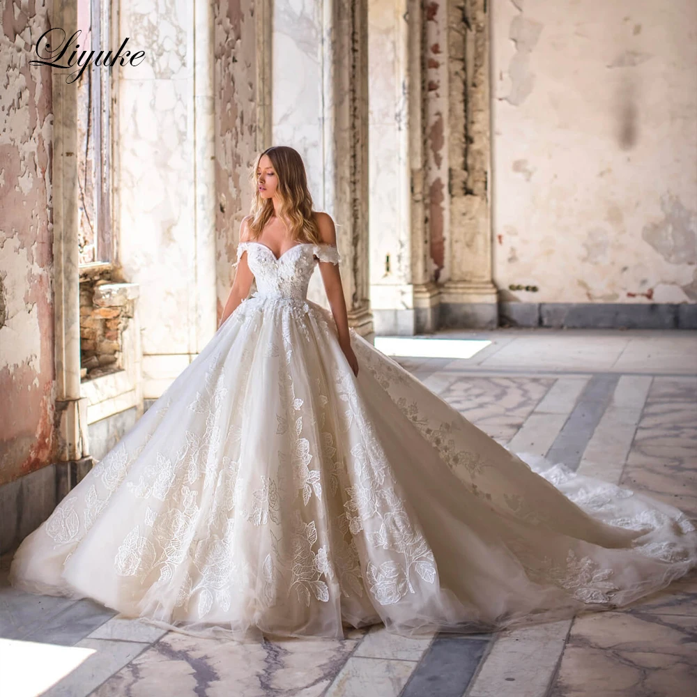 

Liyuke Luxury Appliques Lace Wedding Dress Of Stunning Tulle Off The Shoulder Ball Gown Bridal Skirt