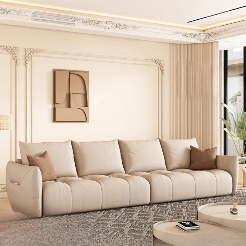 

Italian leather sofa living room small apartment inline three-person light luxury cream front layer cowhide sofa