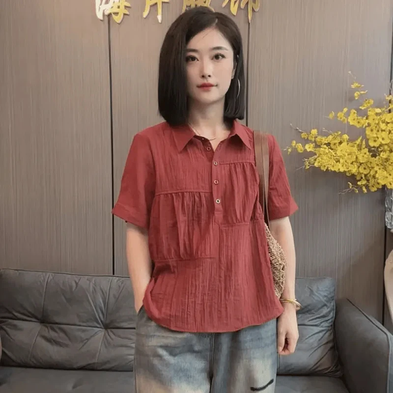 Mode revers épissé couleur unie plis Blouses vêtements pour femmes 2025 été nouveaux hauts amples décontractés chemises de banlieue