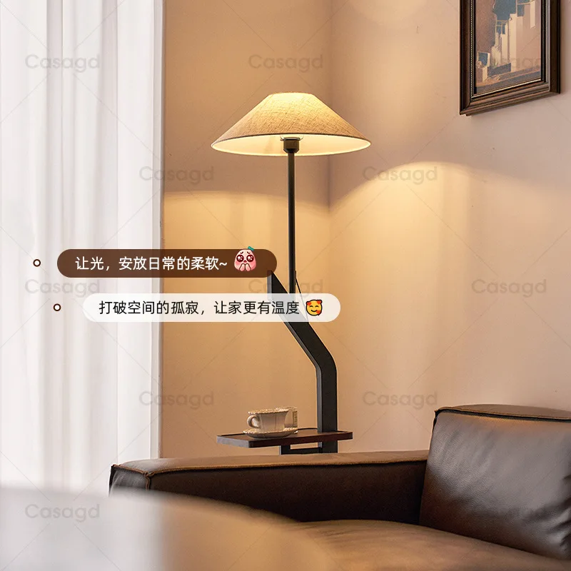 Medieval floor lamp, integrated atmosphere lamp next to the shelf in the living room sofa
