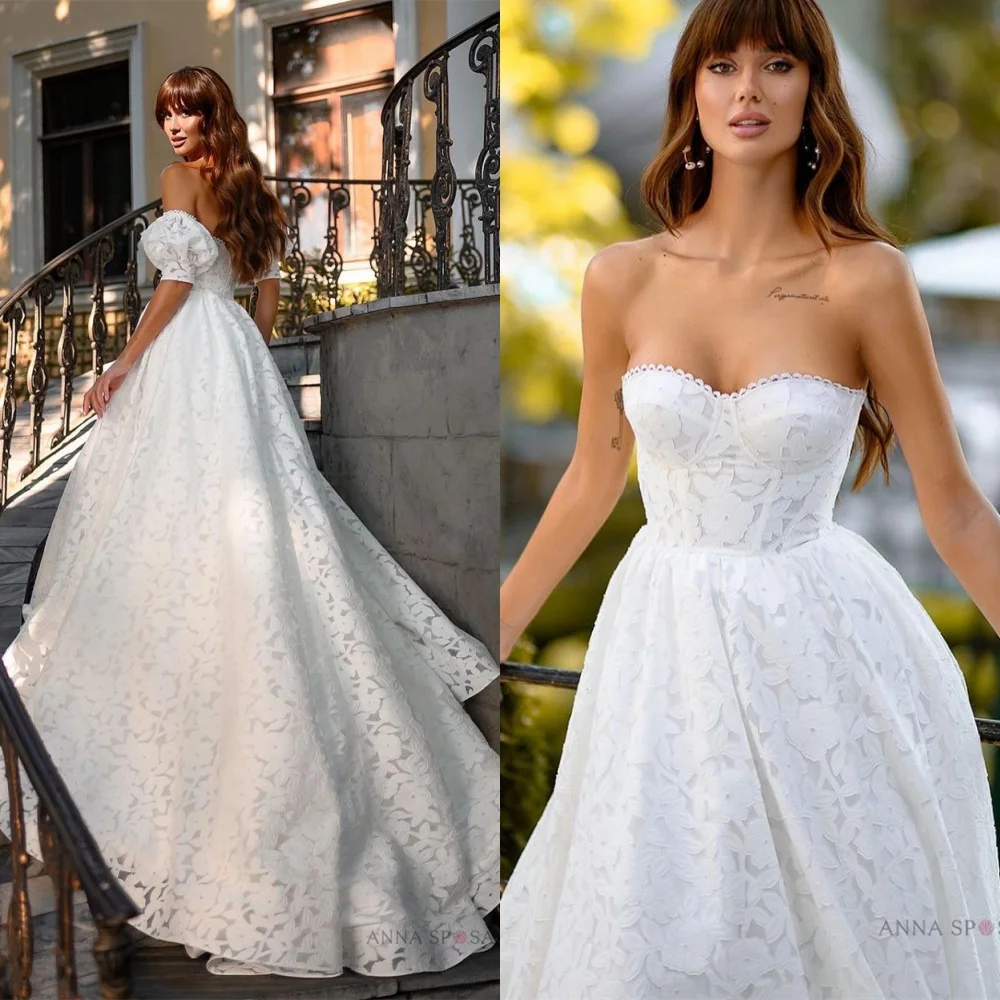 ที่กําหนดเองชุดแต่งงานลูกไม้สีขาว Elegant Strapless ปิดไหล่แขนสั้นชุดเจ้าสาว Chapel Train ชุดเปลือย