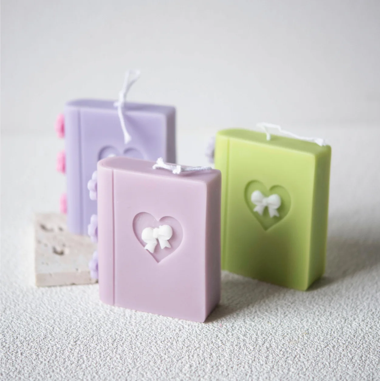 Cute book shapes handmade scented candles. Multi-color book decoration. Custom scented candle