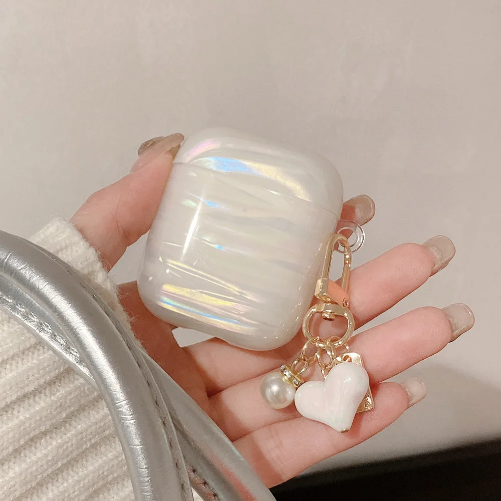 Funda de silicona para auriculares con láser colorido blanco de lujo para apple airpods 2 3 4 pro 2 funda protectora suave con colgante de corazón