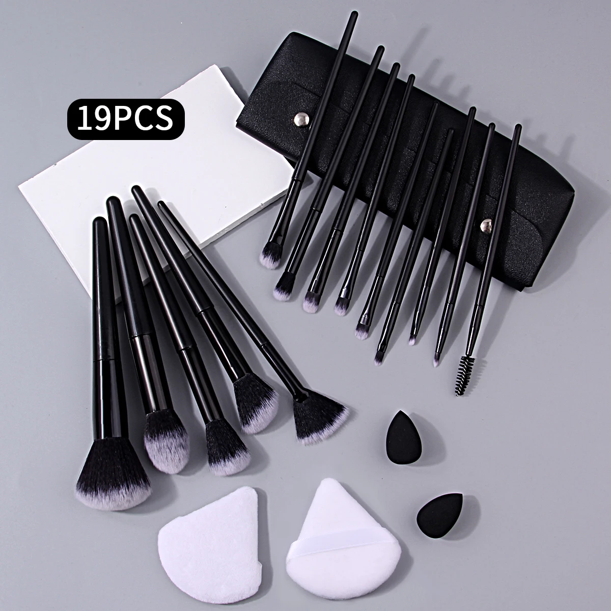 19-delige multifunctionele make-upborstelset en waaiervormige poederdons en mini-spons ei en modieuze opbergtas met dubbele knop