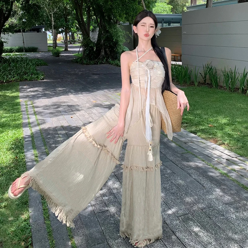 Completo estivo da donna in cotone e lino con top a fascia, pantaloni a gamba larga con nappe e gonna a vita alta in poliestere...