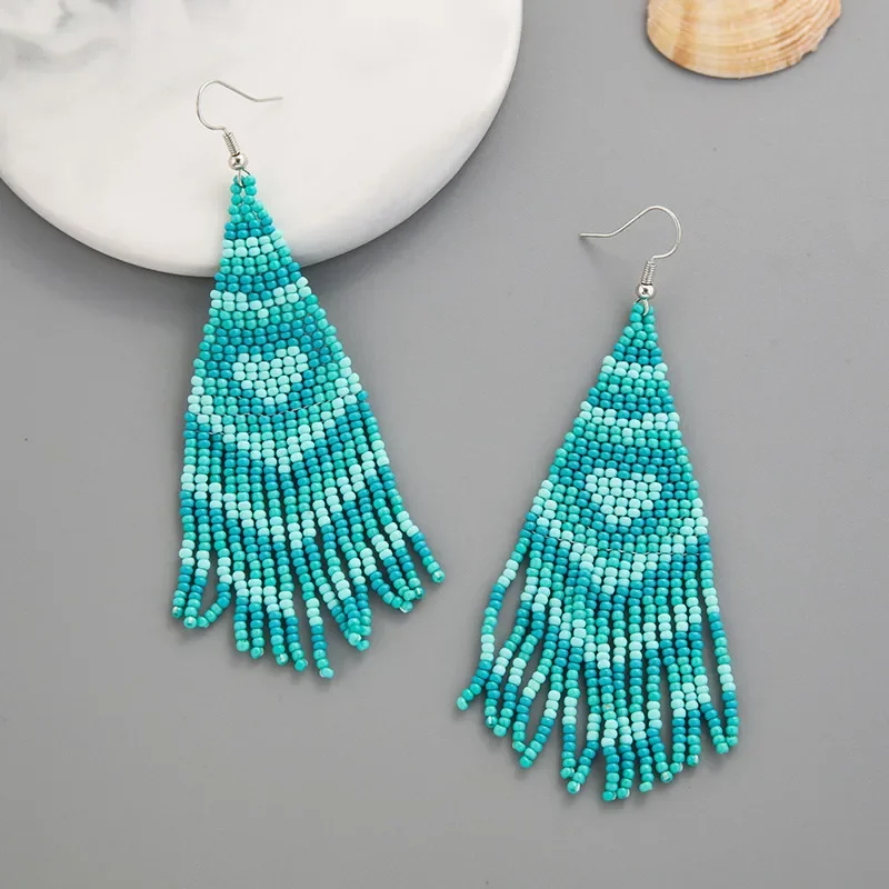 

Fringed earrings Hand woven fashion love Beading Simplicity wave Bohemia alloy ma'am Rice bead earrings