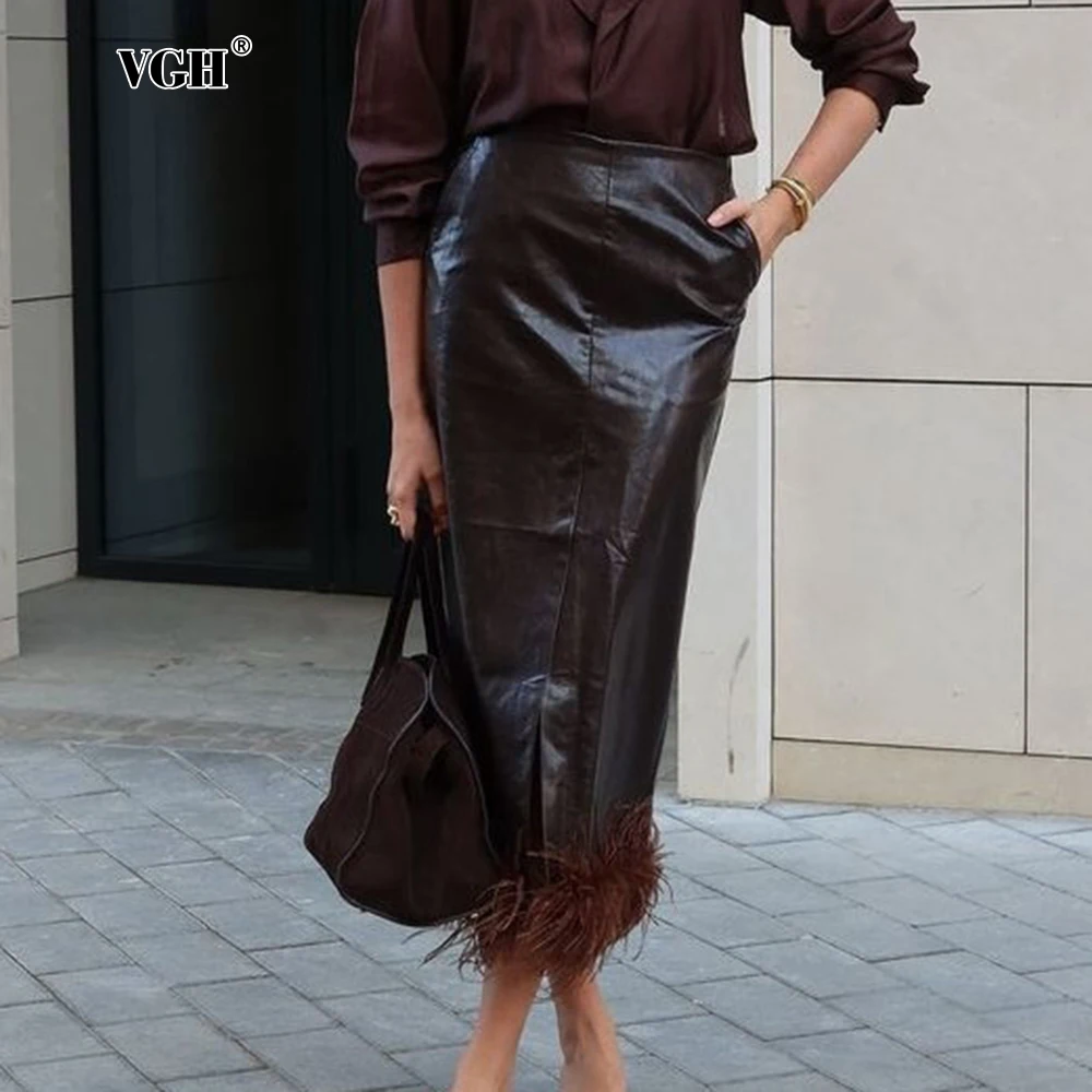 VGH Solid Design Sense Leather Skirt For Women High Waist Patchwork Feathers Bocycon Chic Long Skirts Female Fashion Style New