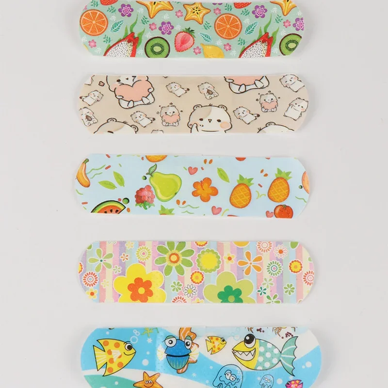 100 ชิ้น/เซ็ตโปร่งใส Band Aid การ์ตูนกันน้ํา First Aid Wound Dressing พลาสเตอร์สําหรับฉุกเฉินผ้าพันแผลกาว