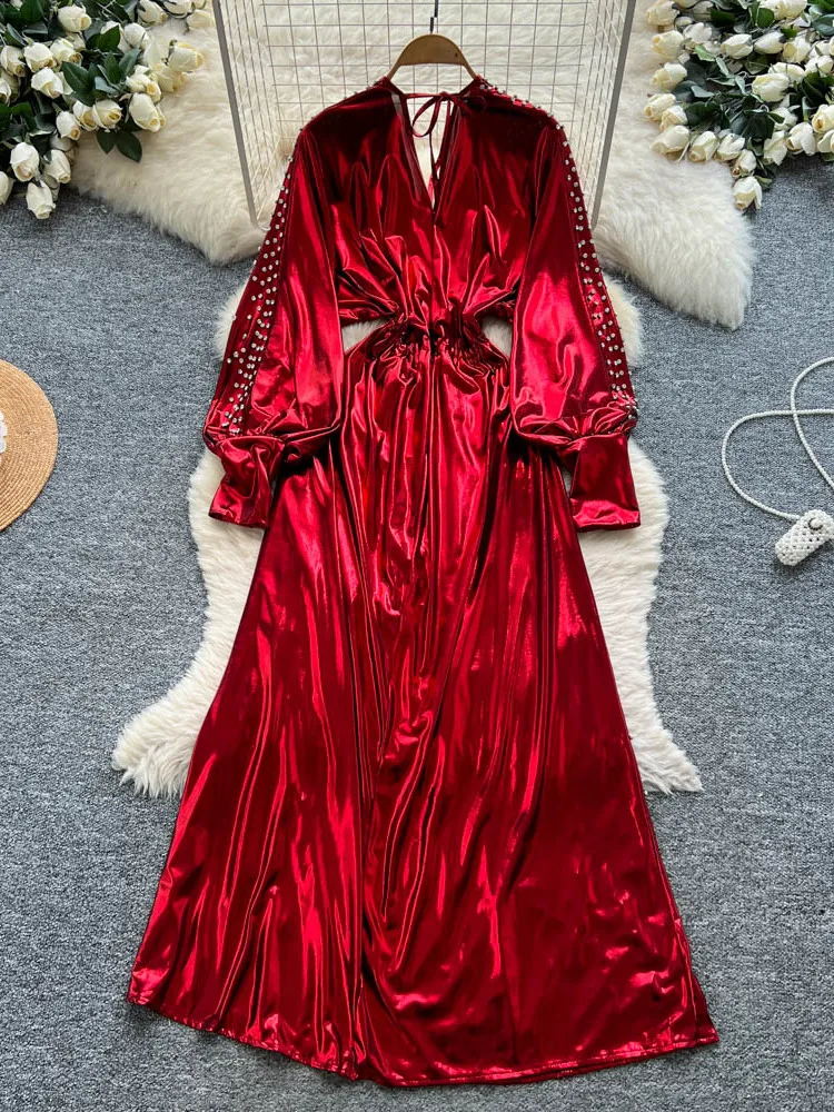 Faionable couleur métal lourd embelli diamant v-ne ceinturé lanterne Sve Dr jupe longue pour femme qui placent la taille