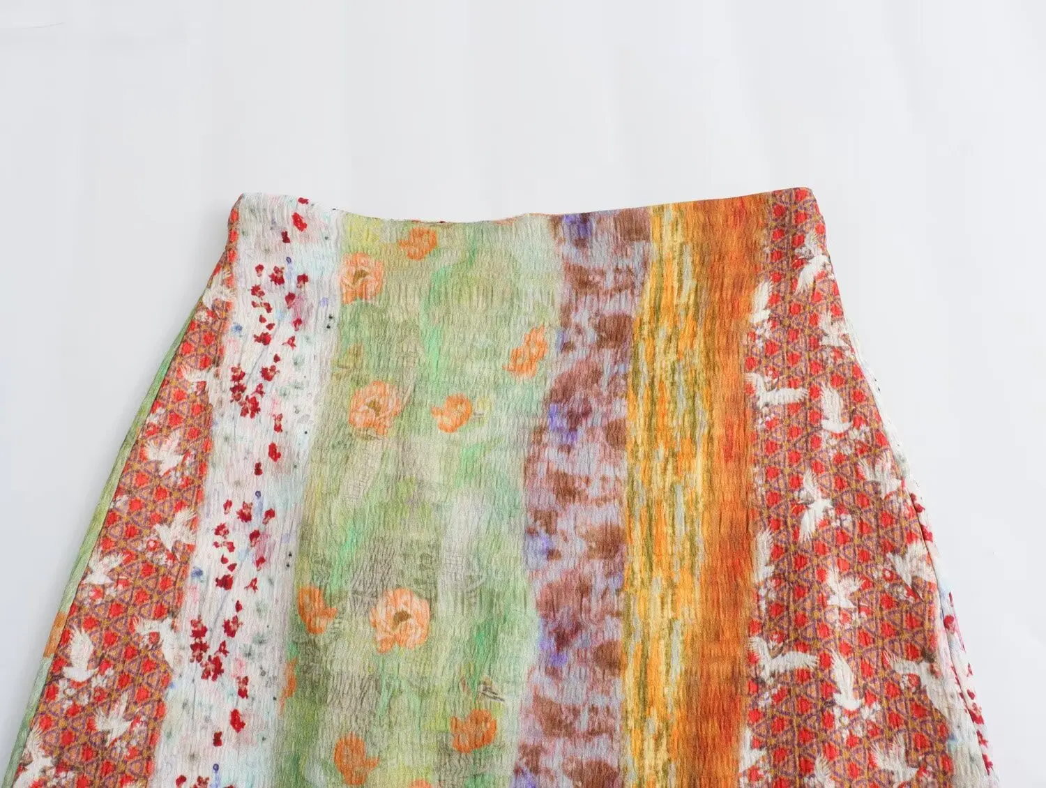 夏の新スタイルの女性のロングスカート透かし絵画デザインミディスカートフレンチスタイルプリントカジュアルポリエステル繊維