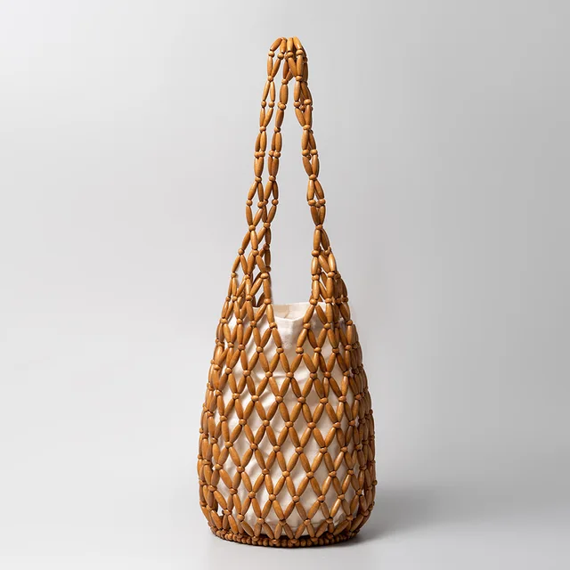 Bolsa de mão feminina tecido design requintado oco-para fora grânulo de madeira tote balde bolsa de ombro feminino artesanal frisado bolsa
