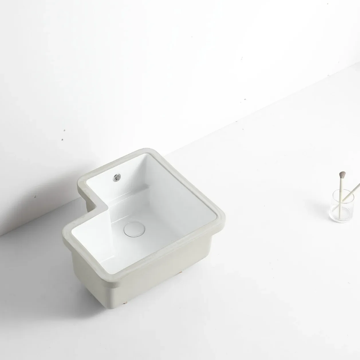 Corner under counter basin, deepened with washboard, recessed sink