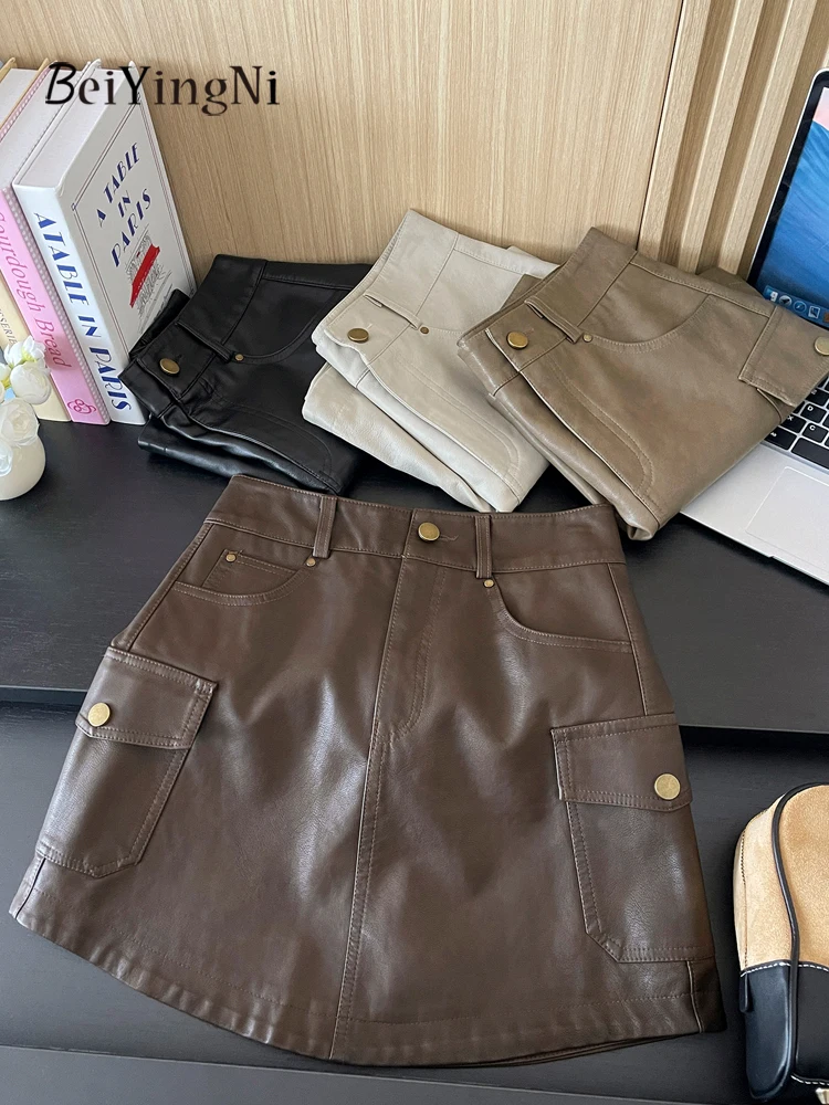 Beiyingni Amerikanischen Stil PU Leder Mini Rock Frauen Vintage Harajuku Hohe Taille A-line Cargo Röcke Damen Casual Straße Faldas