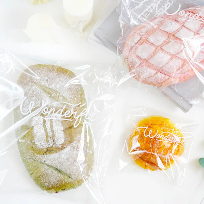 

100Pcs 23x27cm Large Transparent Clear Letter Printed Iced Bread Packaging Toast Self-adhesive Puff Donut Meal Bags