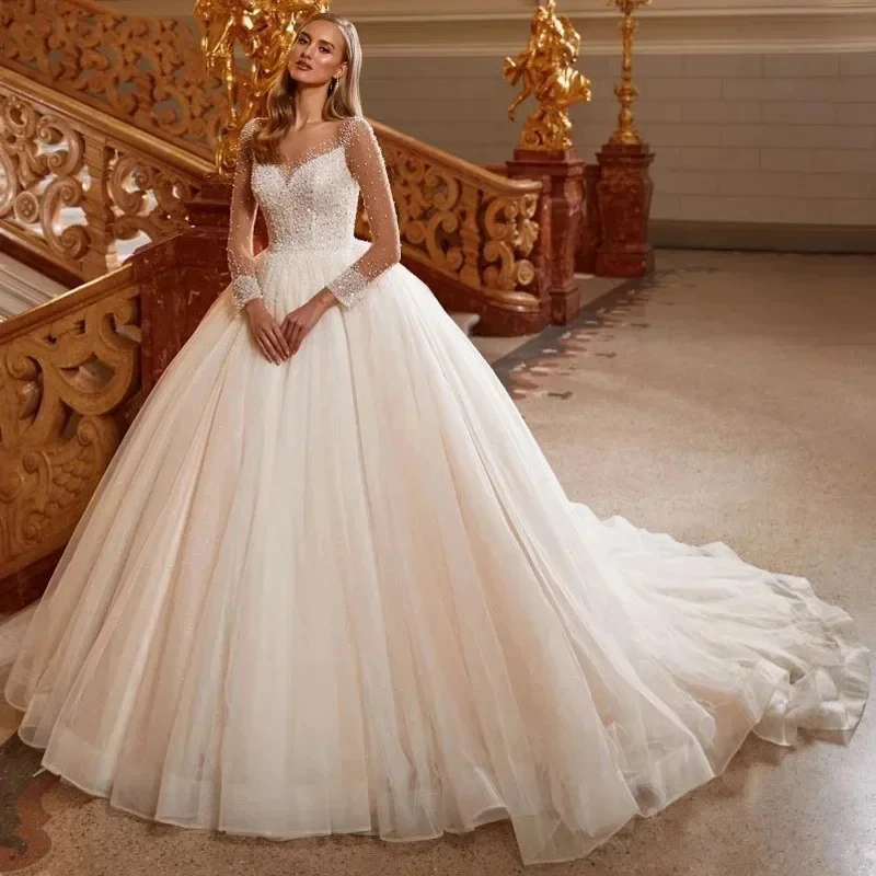 

2025 Sexy Crystal Princess Wedding Dresses Scoop Long Sleeve Pearls Tulle Elegant New Bridal Dress Ball Gown Vestidos De Novia