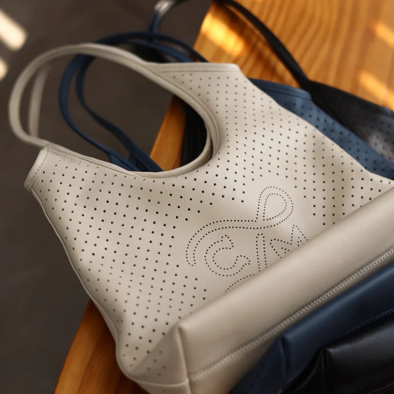 

Women Genuine Leather Tote Luxury Designer Shoulder Bags Unique Hollowed-out Soft Handbag 2025 Summer New Arrival