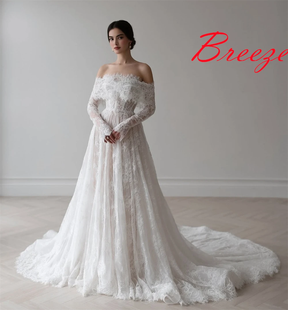 Op maat gemaakte witte organza trouwjurk van hoge kwaliteit, prachtige boothals, lange mouwen, kapelsleep, kanten rugloze bruidsjurken