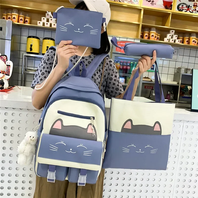 schoolbag women\'s new cartoon cute cat schoolbag for elementary school students for grades three to six four-piece backpack