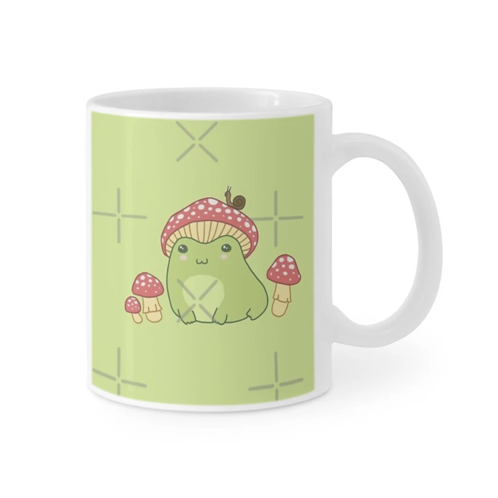 

Kawaii Frog with Mushroom Hat Cottagecore Aesthetic, Toadstool and Snail Companion, Perfect for Frogge Lovers Coffee Milk Cup