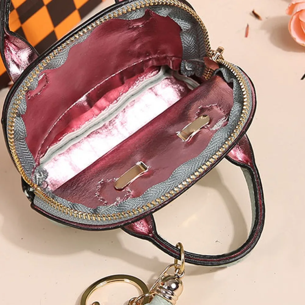 Mini saco de auscultadores de luxo com chaveiro para meninas Mini bolsa de moedas Bolsa de couro Mini bolsa de presente