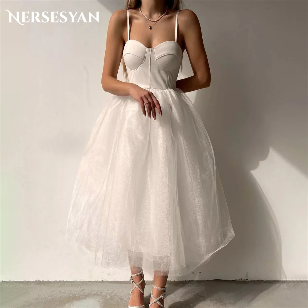 

Nersesyan Eleghant Glitter Wedding Dresses A-Line Spaghetti Straps Tea Length Bridal Gowns Backless Sparkly Sequins Bride Dress