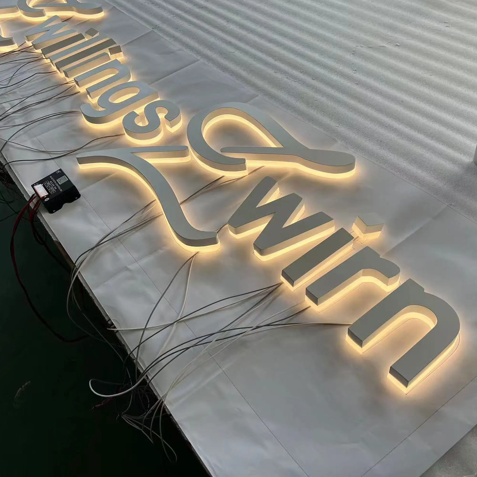 Waterproof halo lit led channel letters with warm led lighting