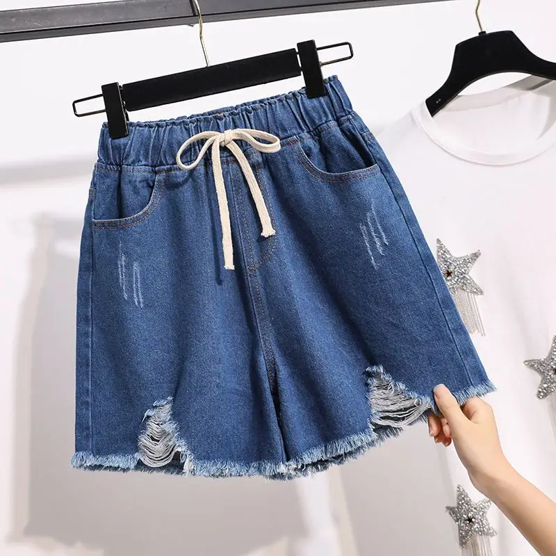 Fashion Elastic Lace Up Spliced Tassel Denim Shorts Women's Clothing 2024 Summer New Loose Solid Color High Waist Casual Shorts