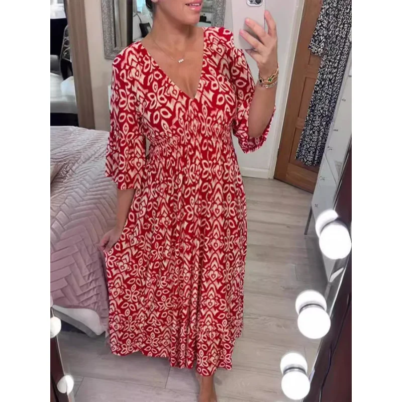 

Новинка 2026: Европейская и американская женская одежда больших размеров. Платье с V-образным вырезом и цветочным принтом, с рукавами три четверти и свободным кроем.