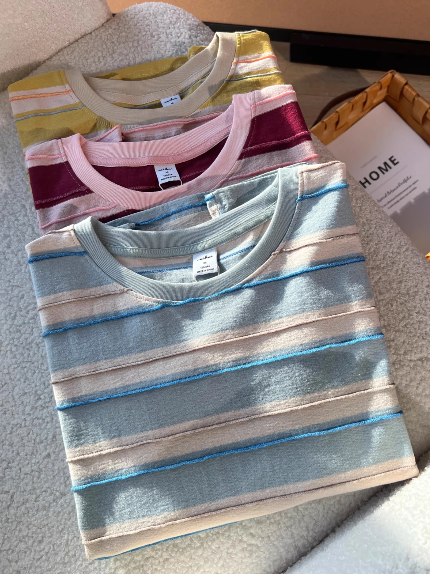 เสื้อยืดผู้หญิงลายทางสไตล์ลำลองหลวมๆ แฟชั่นฤดูร้อน 2025 ทรงเกาหลี ใส่ได้ทุกโอกาส ใส่สบาย เหมาะกับการเดินทาง