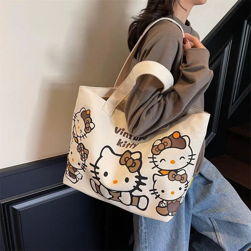 

Sanrio Hello Kitty Girl Canvas Bag Student High-Capacity Commute Kawaii Fashion New Style Birthday Present Zipper Tote Bag Hot
