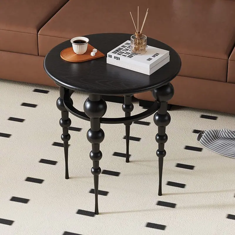 

room sofa next to solid wood edge corner few bedroom bedside bedside mini coffee table balcony small tea table