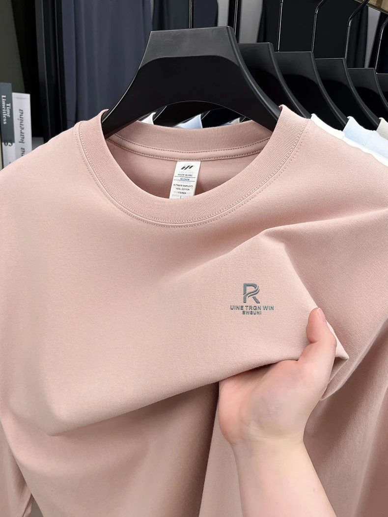 T-shirt a maniche lunghe da uomo in puro cotone di fascia alta 2025 Nuova primavera e autunno inverno girocollo allentato con cappuccio tinta unita da uomo