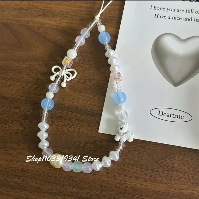 Korean Cute White Bow Puppy Beaded Phone Charms Chain For iPhone 16 Accessories Phone Strap Anti-Lost Lanyard Hanging Rope Girl view 3