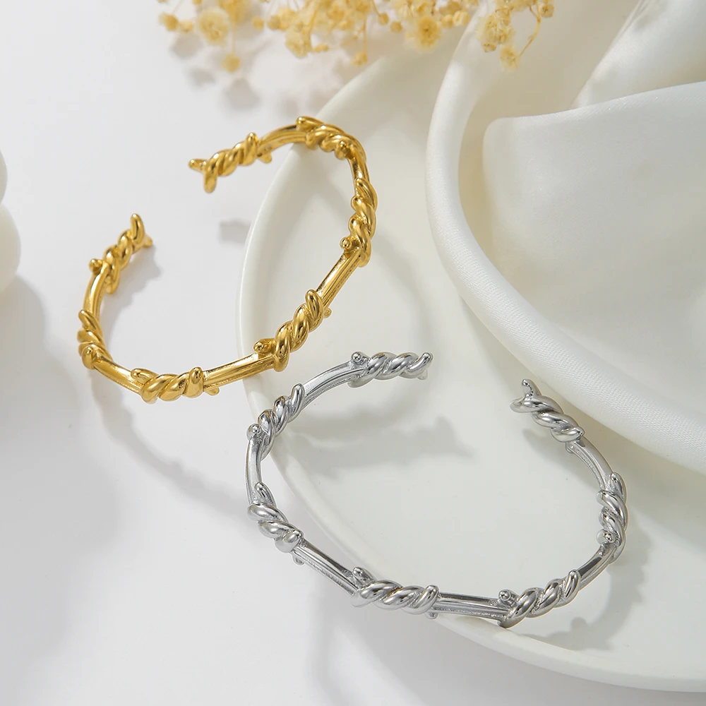 

Classic Simple 18K Gold Stainless Steel Open Bracelet Women's Light Luxury Men's Winding Riveted Titanium Steel Couple Bracelet