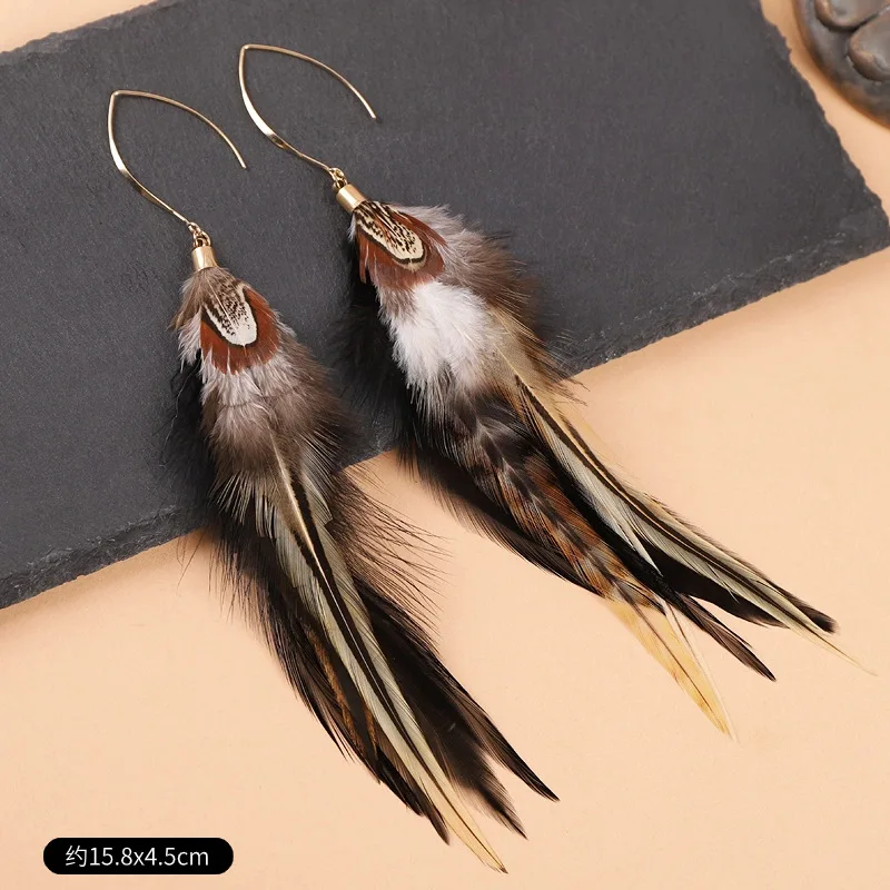 Pendientes de plumas exagerados únicos, pendientes largos de plumas creativas, pendientes grandes bohemios de moda, joyería llamativa para mujer al por mayor