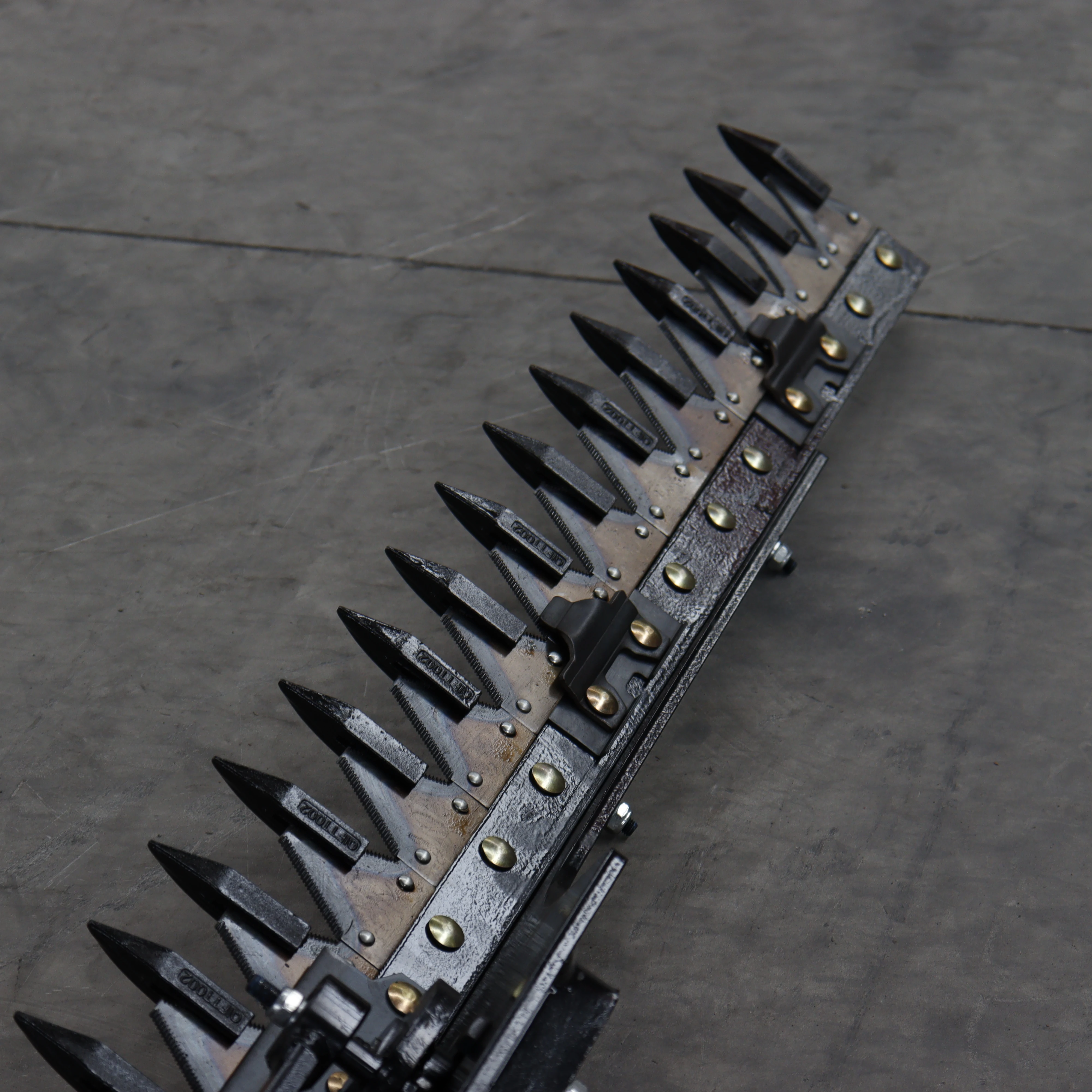 Excavator mounted hedge trimmer with integrated core bearing components