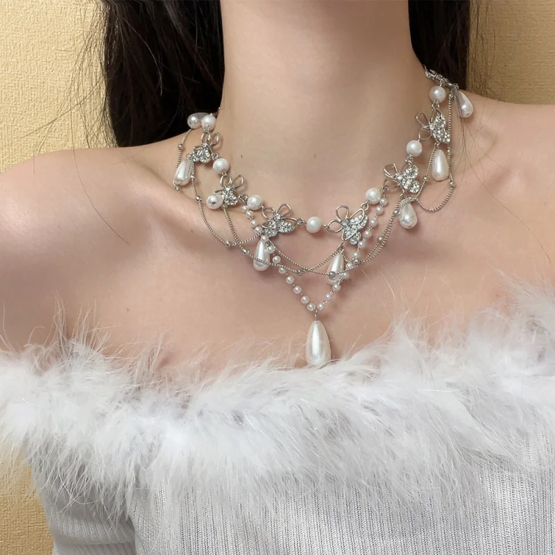 

Light Luxury Socialite Rhinestone Butterfly Water Drop Pearl Tassel Clavicle Chain Fashion Sweet Lady Necklace Wholesale