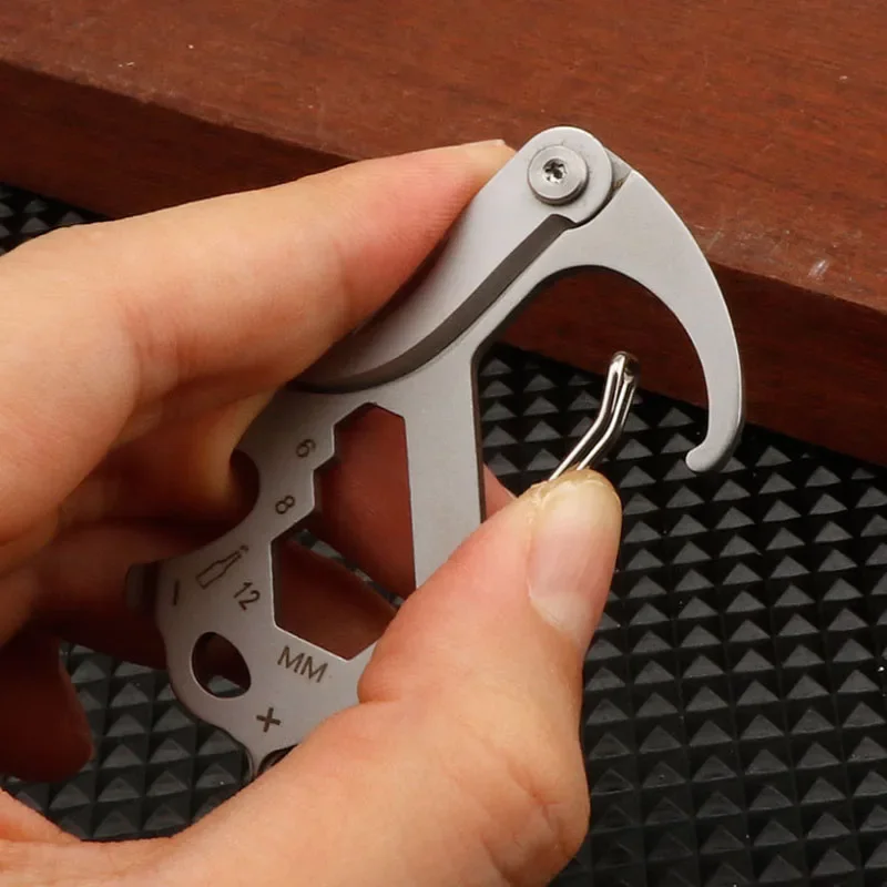 Llavero táctico multiusos con cuchillo plegable de acero inoxidable - imagen 4