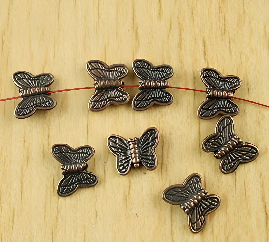 

80pcs 8.5x10.5mm Alloy matel antiqued copper 2sided butterfly spacer beads HWH1947