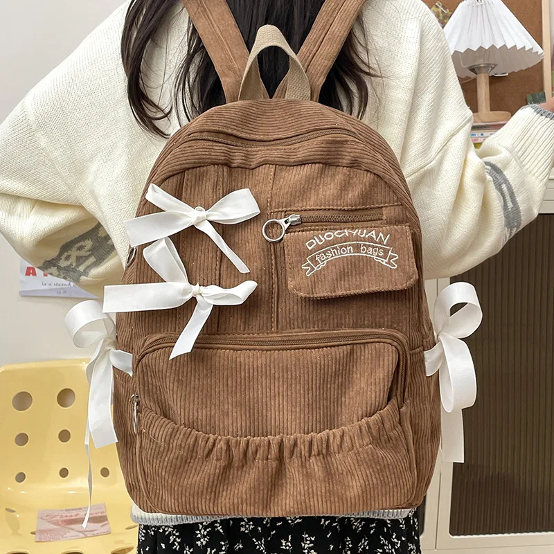 

Модный корейский рюкзак большой емкости для девочек, школьная сумка с бантом, дизайнерские женские дорожные сумки, новинка 2025 года, школьная сумка, милая одежда в японском стиле