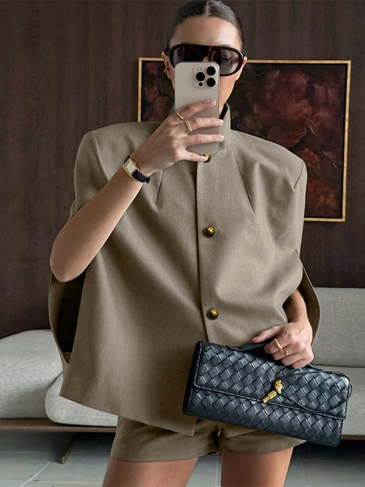 

Trendix Women's Vintage Sleeveless Short Jacket 2026 New Loose Hollow Out Button Cover Up Office Casual High Street Retro Blazer