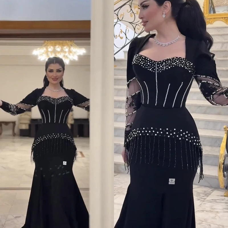 

Women's Onyx Black Long Sleeve Bandage Waist Mermaid Gown with Cascading Beading Sheer Lace Sleeves Formal Evening Dress​