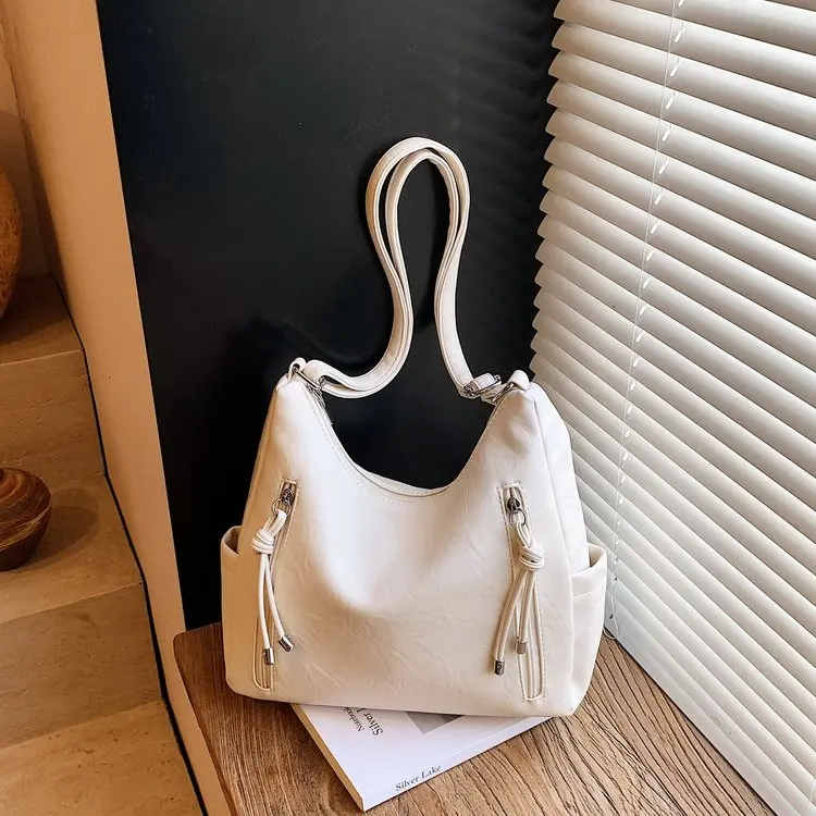 

Large capacity bag women's 2026 new messenger bag texture niche shoulder bag commuter tote bag