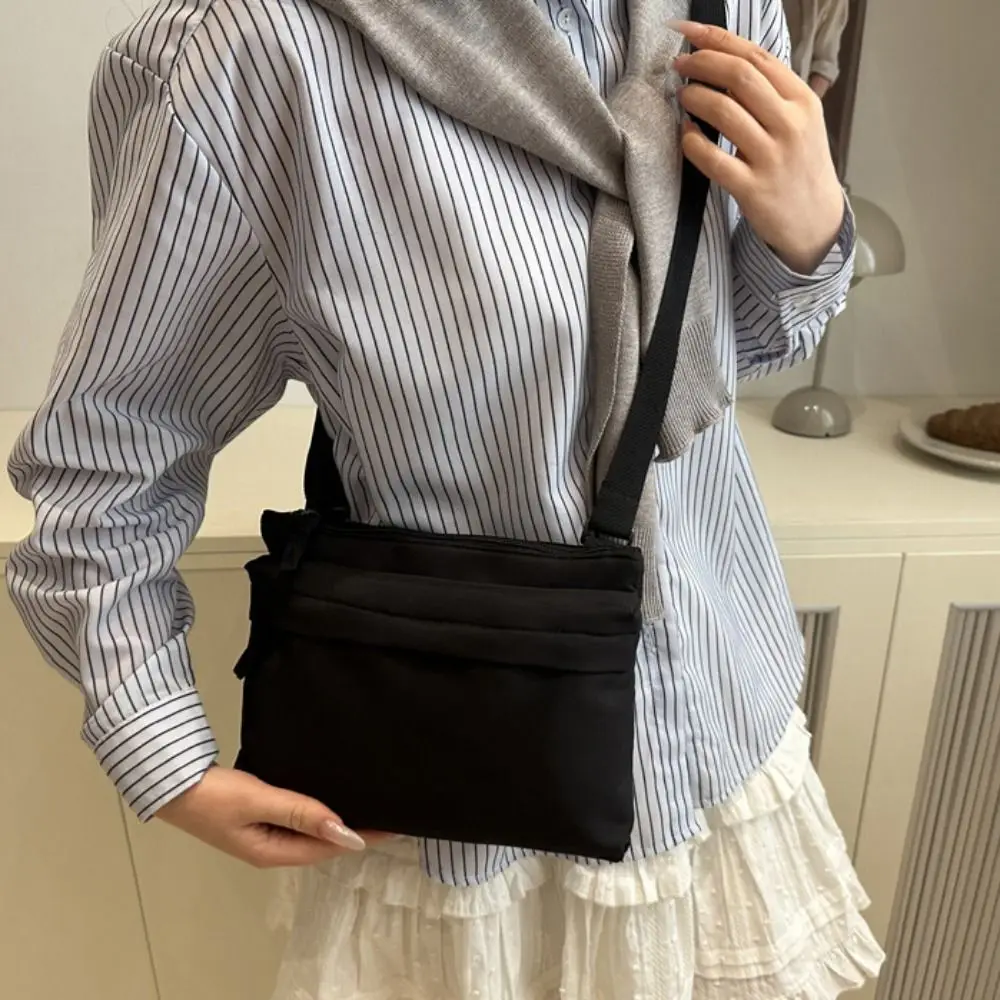 

Large Capacity Nylon Cloth Shoulder Bag Lightweight Leisure Canvas Messenger Bag Commuting Solid Color Crossbody Bag Unisex