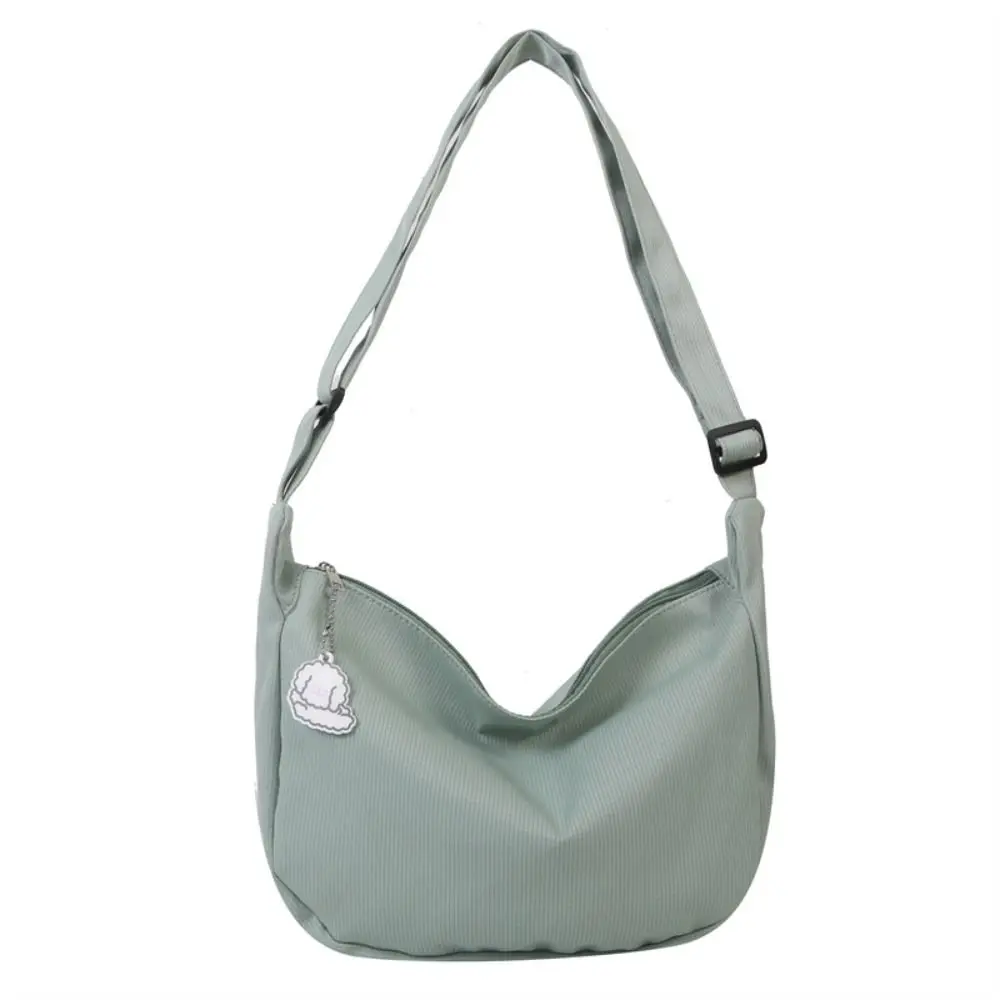 

Korean Style Lightweight Shoulder Bag Large Capacity Solid Color Canvas Bag with Pendant Handbag Cream Color Simple Dumpling Bag