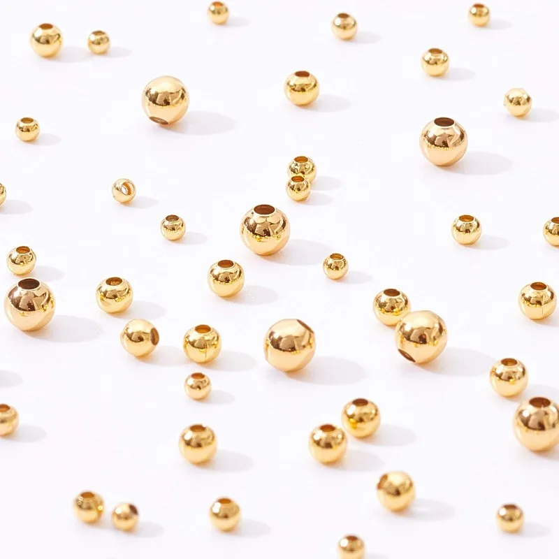200Pcs 18K Gold Plated Brass Beads Round Spacer Beads with 4 Mixed Size(0.5-1.5mm Hole) for Necklaces Bracelets and Jewelry