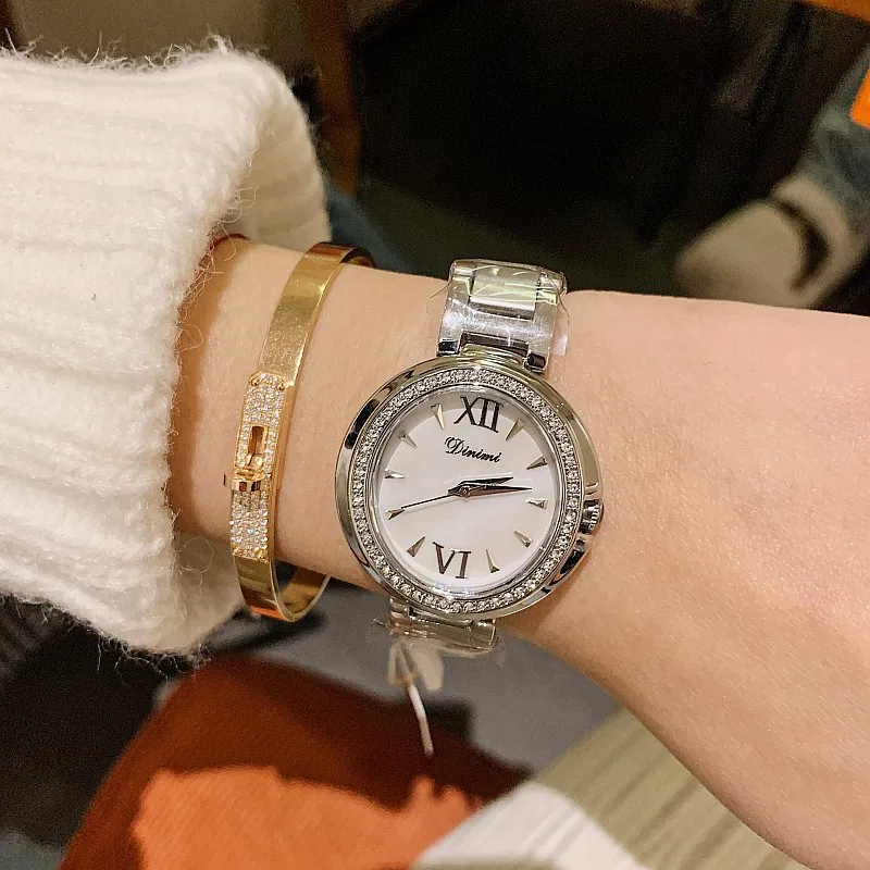 Women's watch with stainless steel strap, elegant oval shape, fashionable and simple design. Suitable for women to wear.