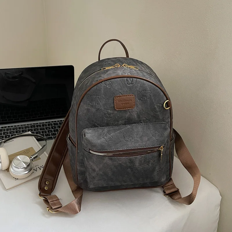 

2025 Women's Large-Capacity Backpack - Retro Embossed Niche Style, Multi-Pocket Travel Bag, Versatile for Outings & Commutes